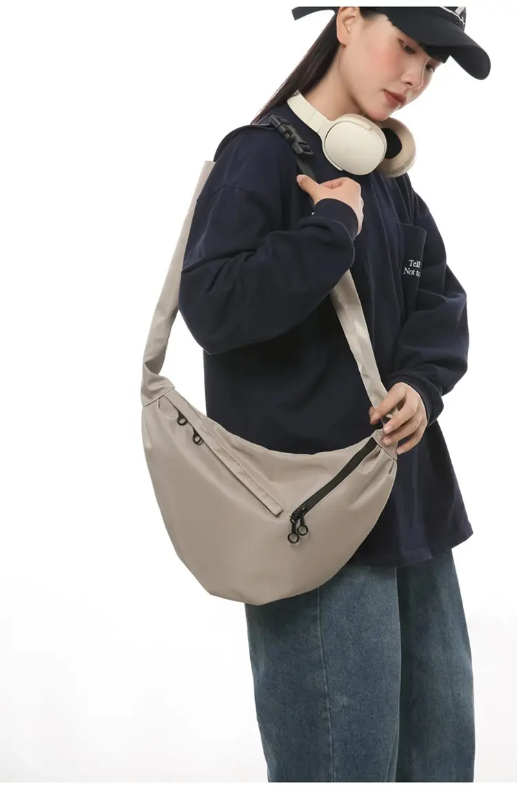 Men's Crossbody Bag Japanese Casual Sports Dumpling Bag Women's Canvas Shoulder Bag Fashionable Brand Men's Satchel luggage and leather goods — feature 24