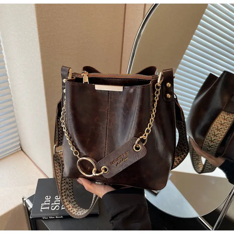 Brown Leather Shoulder Bag with Gold Chain & Ring Design — feature 50