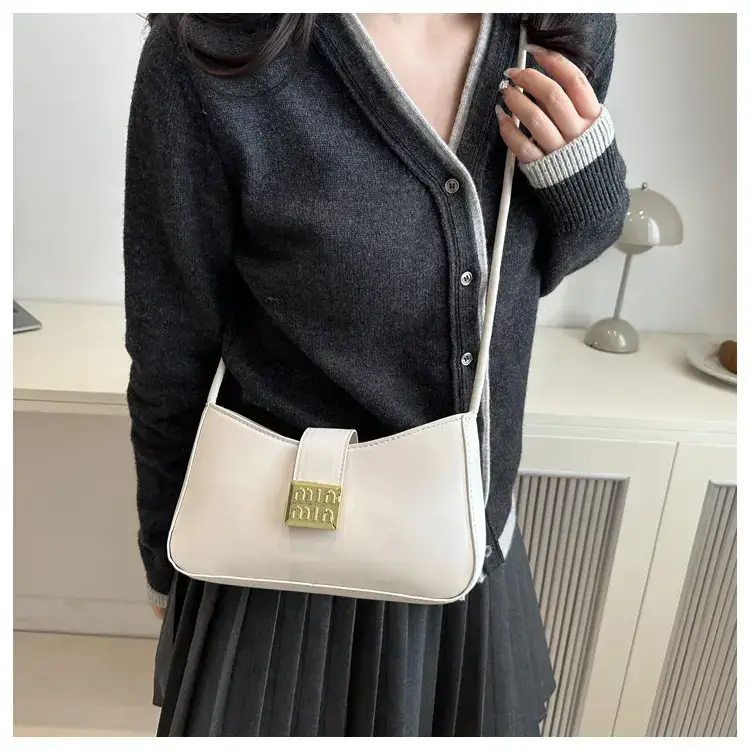 Black French Leather Shoulder Bag with Gold Plated Logo — feature 9