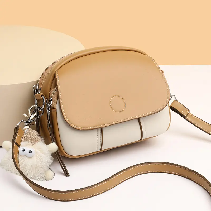 Elegant Mini Crossbody Bag with Pendant for Women - Image 3