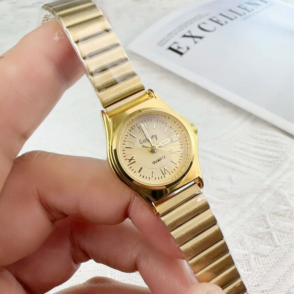 Gold Quartz Women's Watch with Cross-Body Band - Image 9