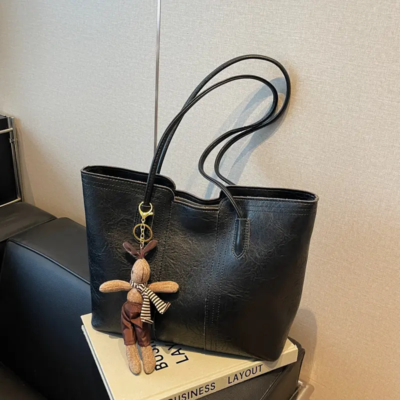 Women's Black Leather Shoulder Bag with Wooden Charm - Image 5