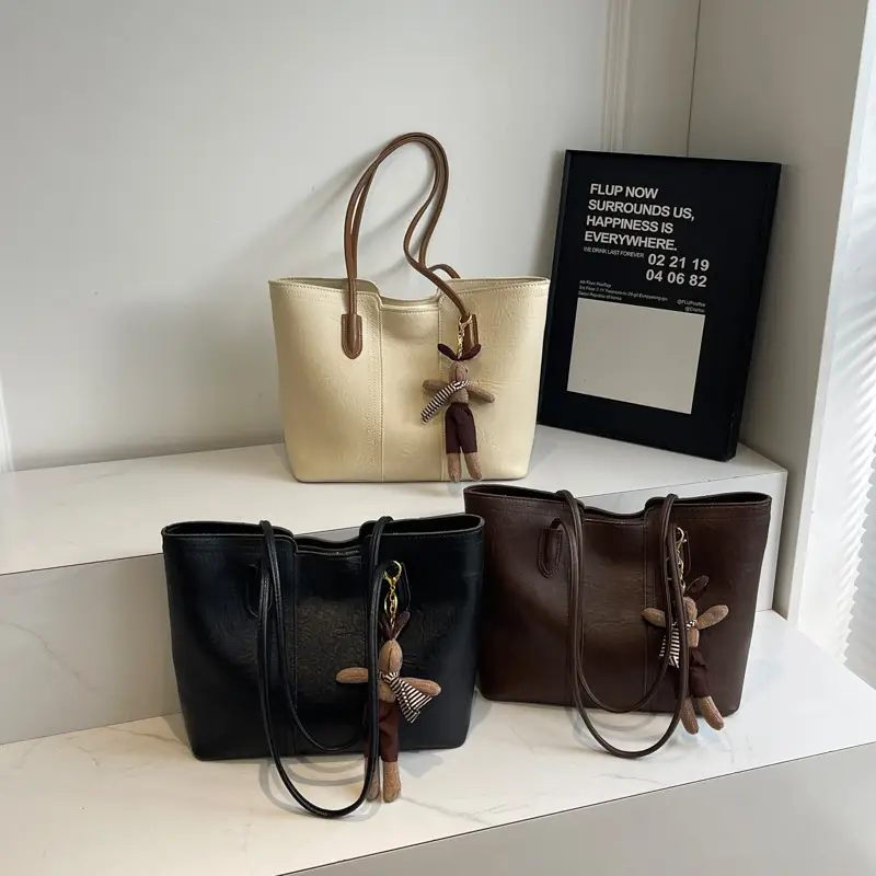 Women's Black Leather Shoulder Bag with Wooden Charm - Image 8