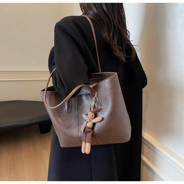 Women's Black Leather Shoulder Bag with Wooden Charm — feature 11