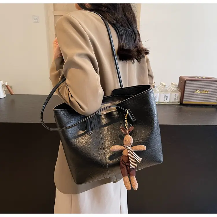 Women's Black Leather Shoulder Bag with Wooden Charm — feature 14