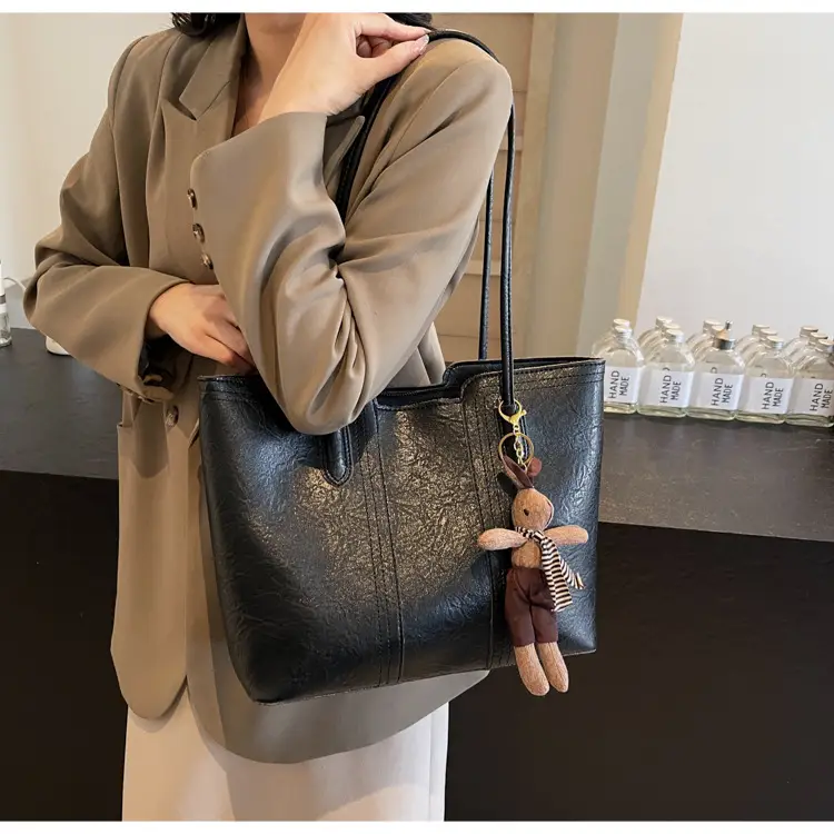 Women's Black Leather Shoulder Bag with Wooden Charm — feature 15