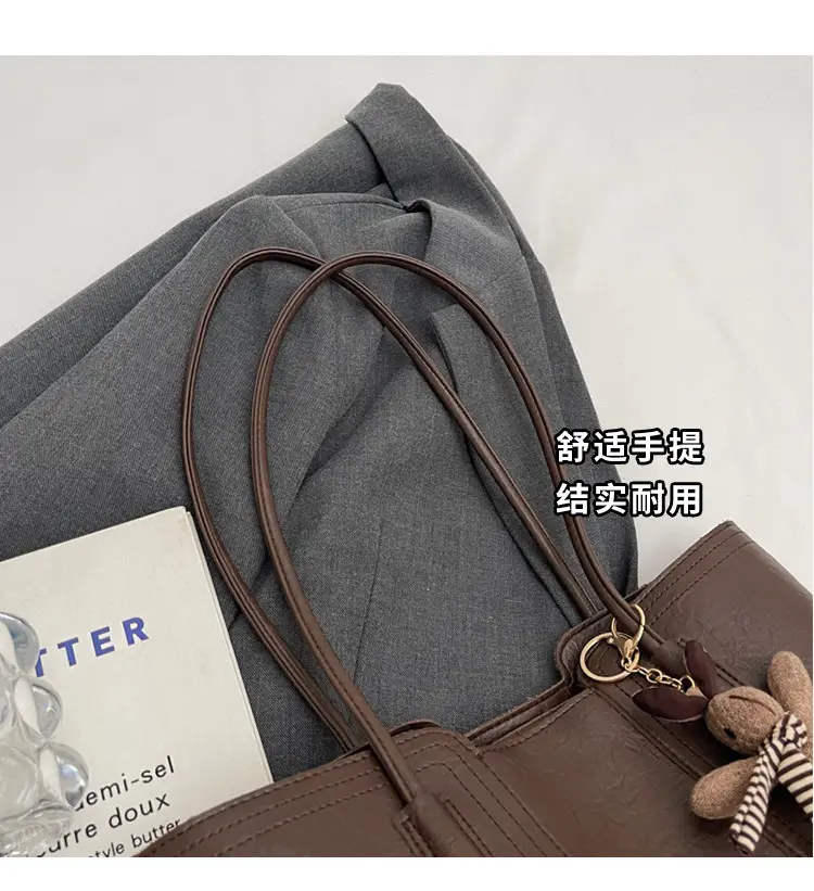 Women's Black Leather Shoulder Bag with Wooden Charm — feature 4