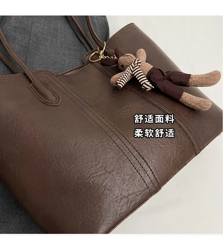 Women's Black Leather Shoulder Bag with Wooden Charm — feature 5