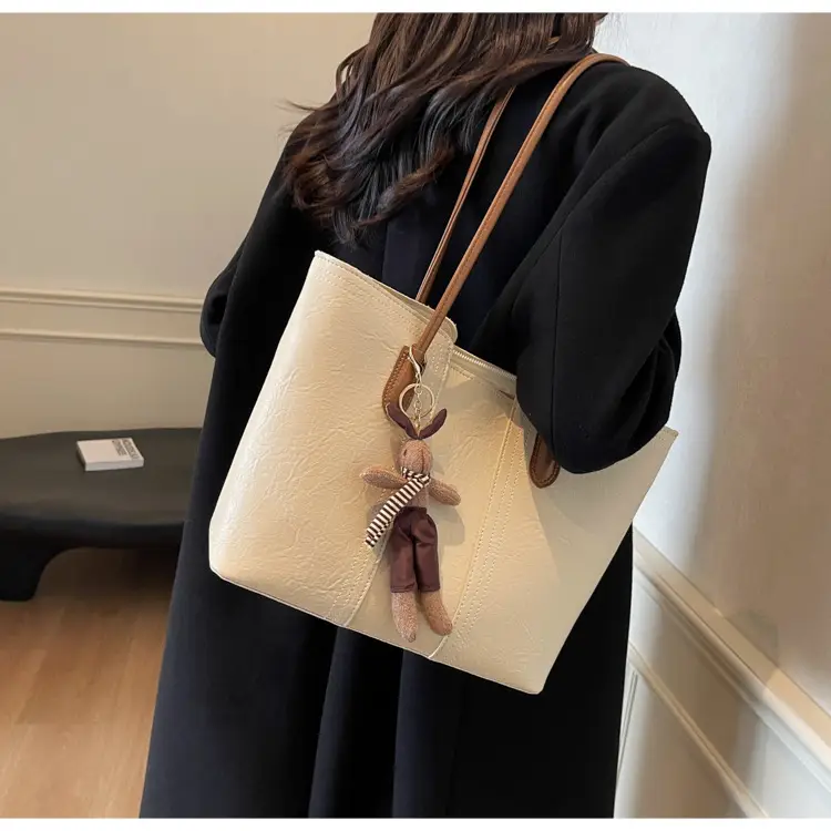 Women's Black Leather Shoulder Bag with Wooden Charm — feature 8
