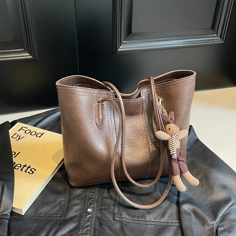 Women's Black Leather Shoulder Bag with Wooden Charm - Image 4
