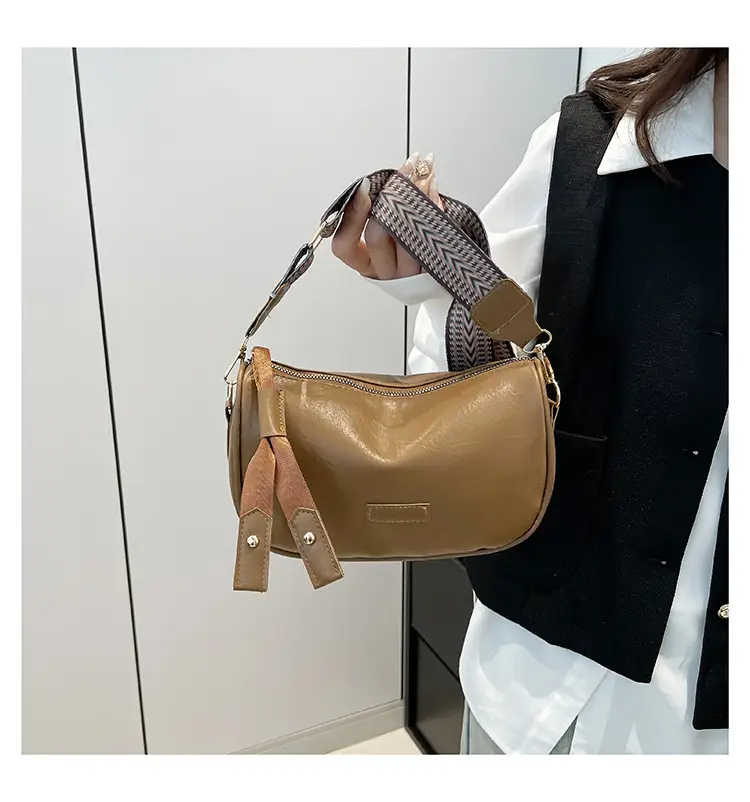 Black French Style Crossbody Bag with Textured Strap — feature 11