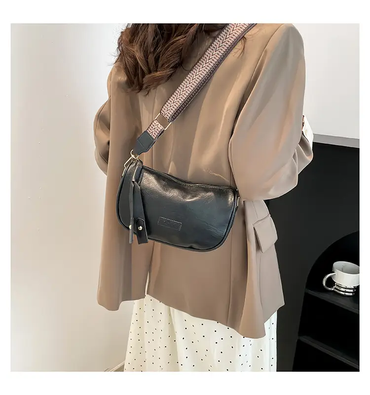 Black French Style Crossbody Bag with Textured Strap — feature 12