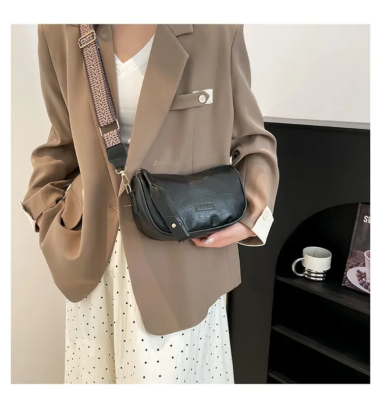 Black French Style Crossbody Bag with Textured Strap — feature 13
