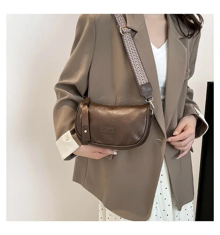 Black French Style Crossbody Bag with Textured Strap — feature 17