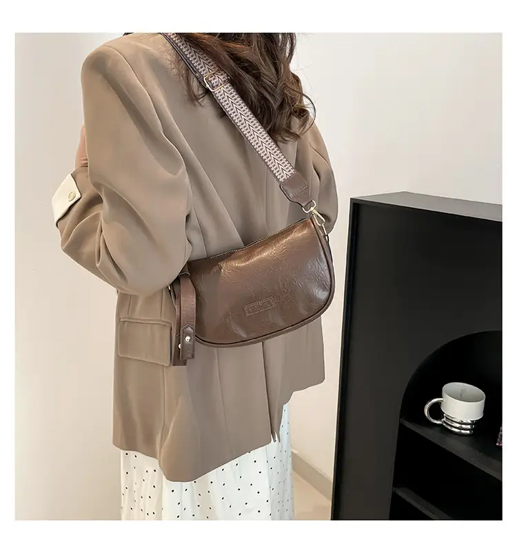 Black French Style Crossbody Bag with Textured Strap — feature 18
