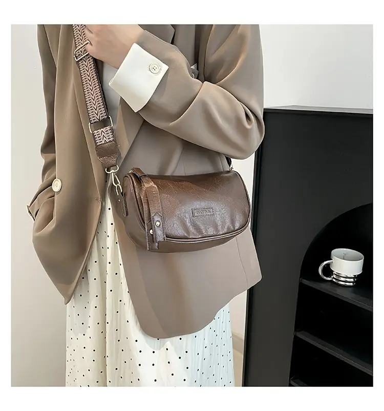Black French Style Crossbody Bag with Textured Strap — feature 19