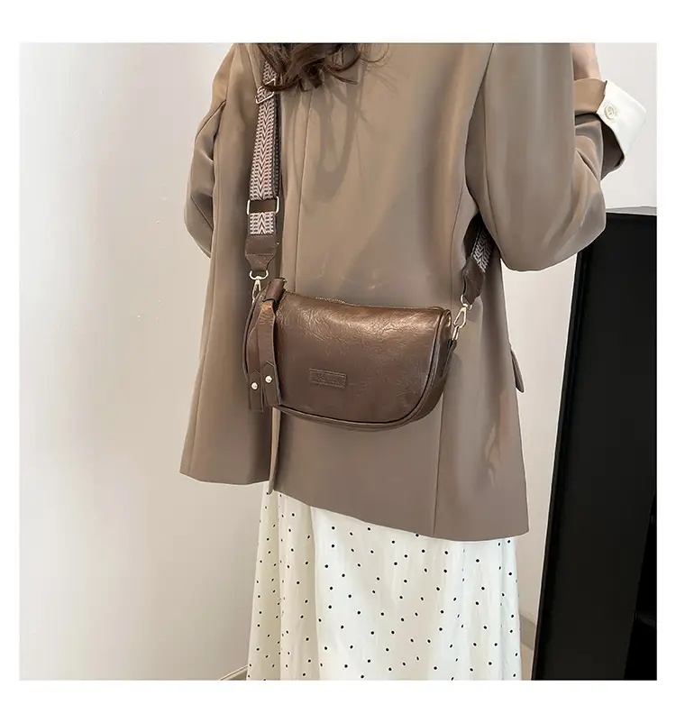 Black French Style Crossbody Bag with Textured Strap — feature 21