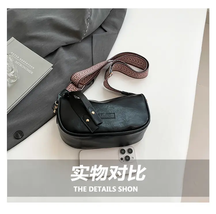 Black French Style Crossbody Bag with Textured Strap — feature 5
