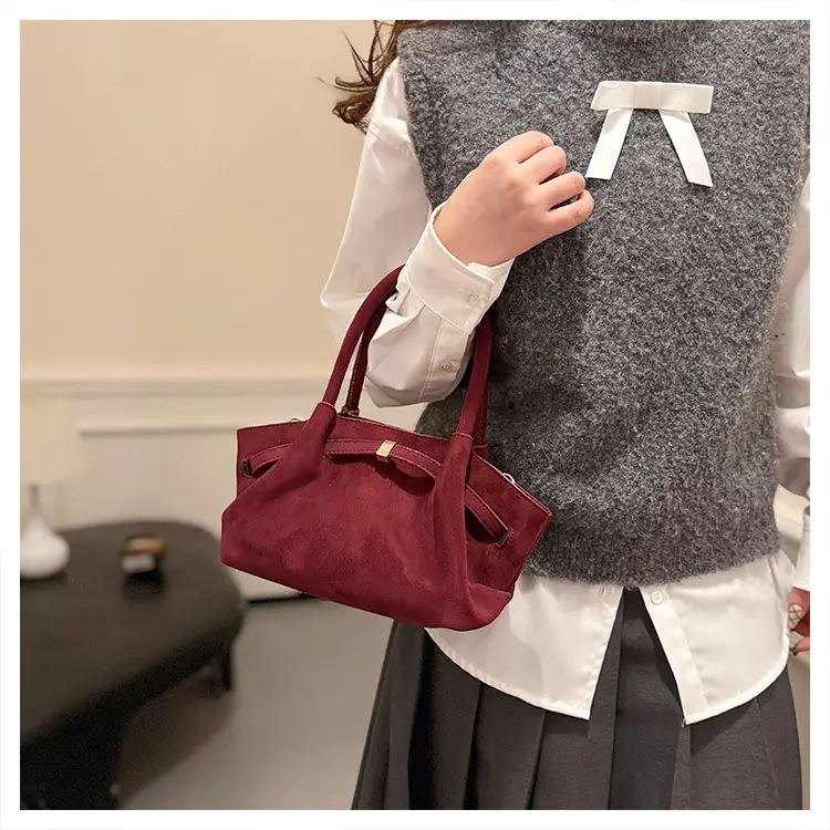 Maroon Pleated Hand Tote Bag with Vintage Wings Design — feature 13