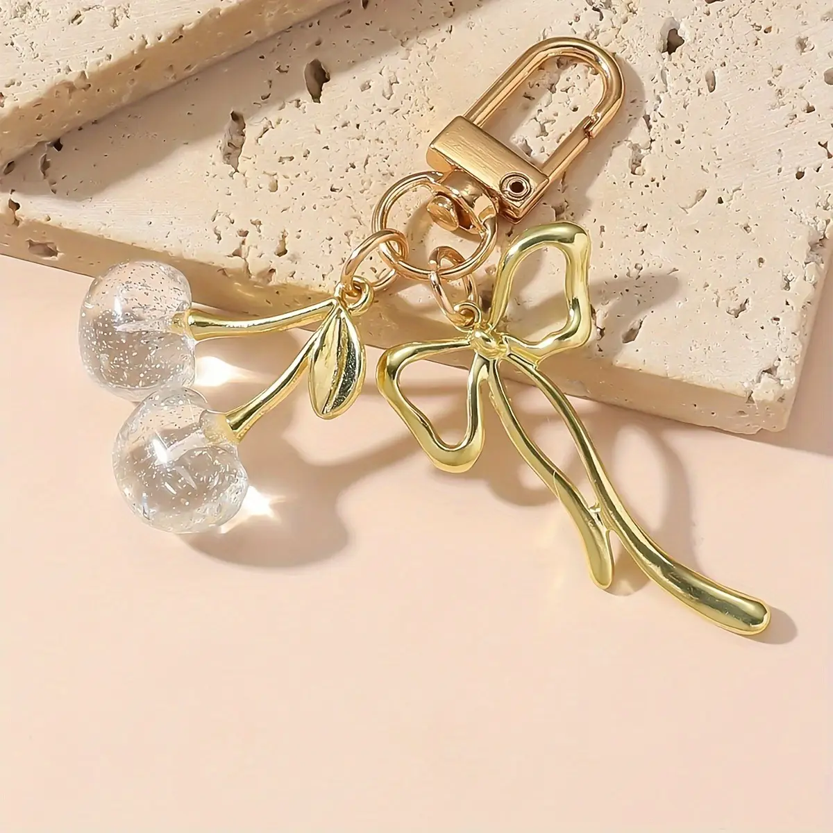 Golden Crystal Keychain with Bow Pendant Design - Image 5