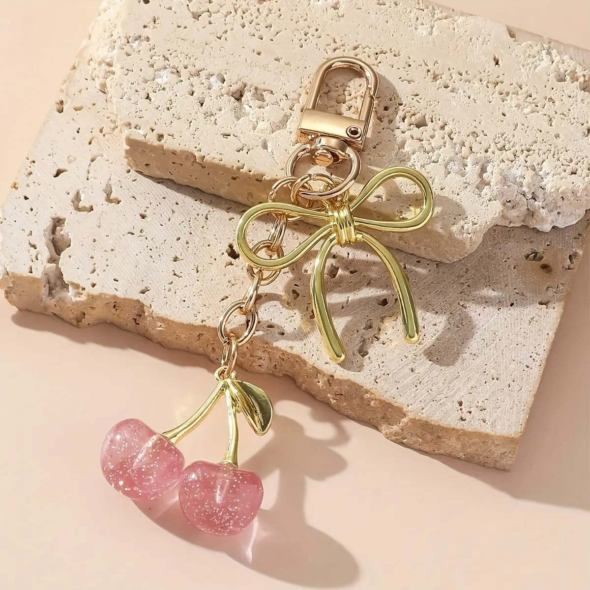 Golden Crystal Keychain with Bow Pendant Design — feature 11