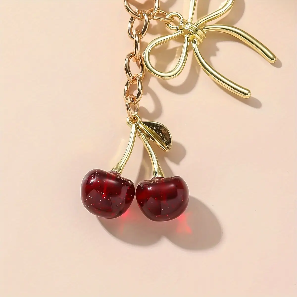 Golden Crystal Keychain with Bow Pendant Design — feature 5