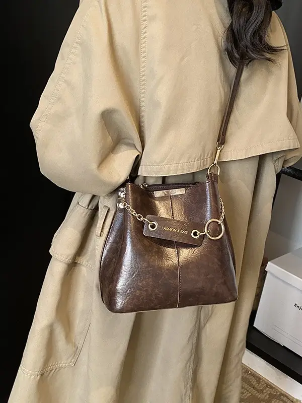 Women's Brown Leather Bucket Bag with Chain Strap