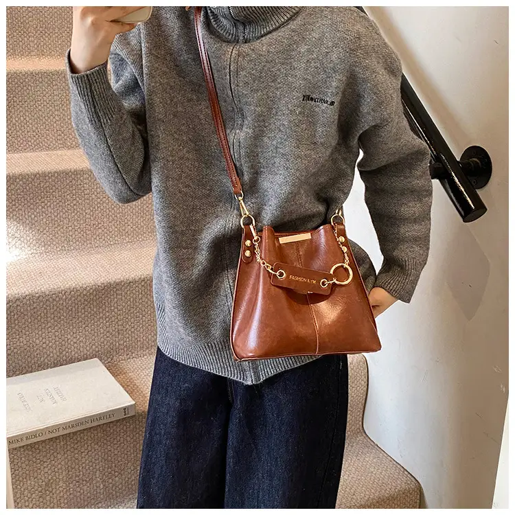 Women's Brown Leather Bucket Bag with Chain Strap — feature 17