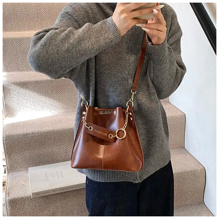 Women's Brown Leather Bucket Bag with Chain Strap — feature 18