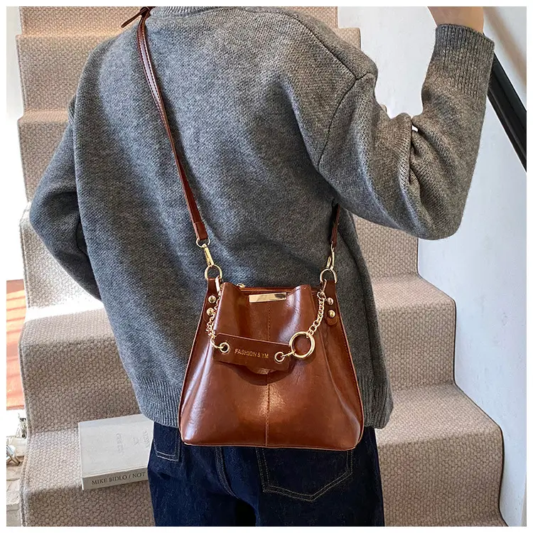Women's Brown Leather Bucket Bag with Chain Strap — feature 19