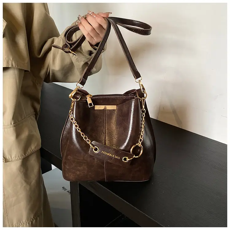 Women's Brown Leather Bucket Bag with Chain Strap — feature 20