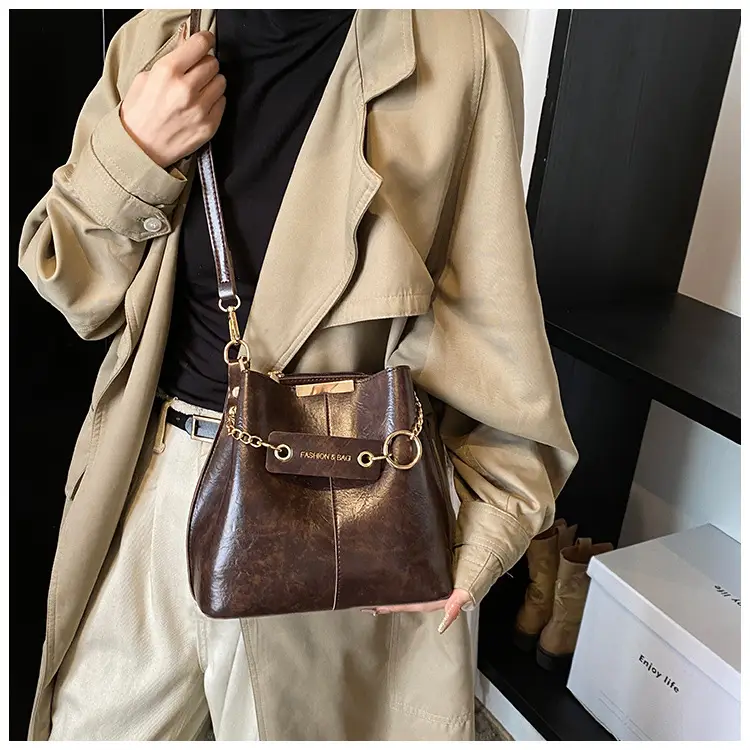 Women's Brown Leather Bucket Bag with Chain Strap — feature 21