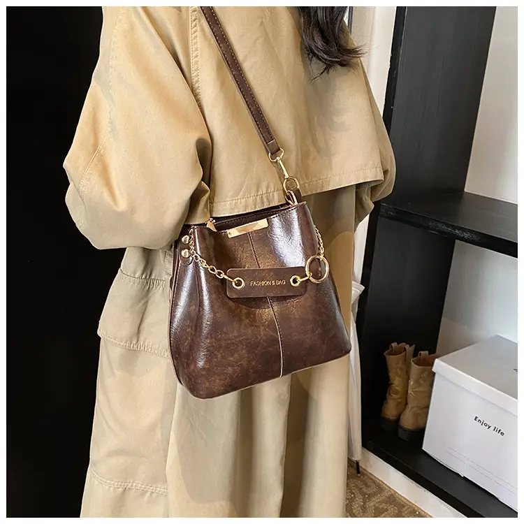 Women's Brown Leather Bucket Bag with Chain Strap — feature 23