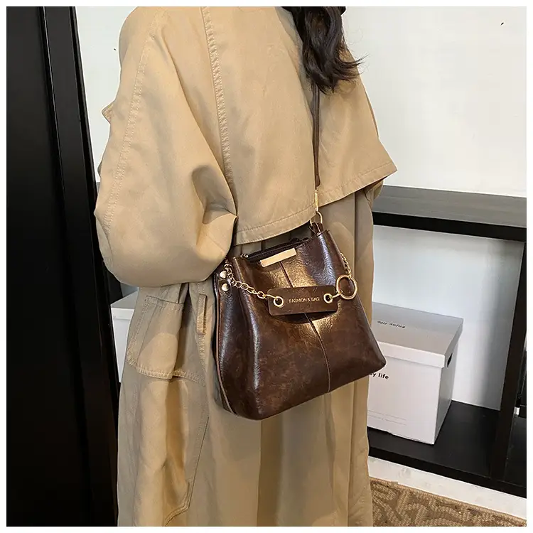 Women's Brown Leather Bucket Bag with Chain Strap — feature 24