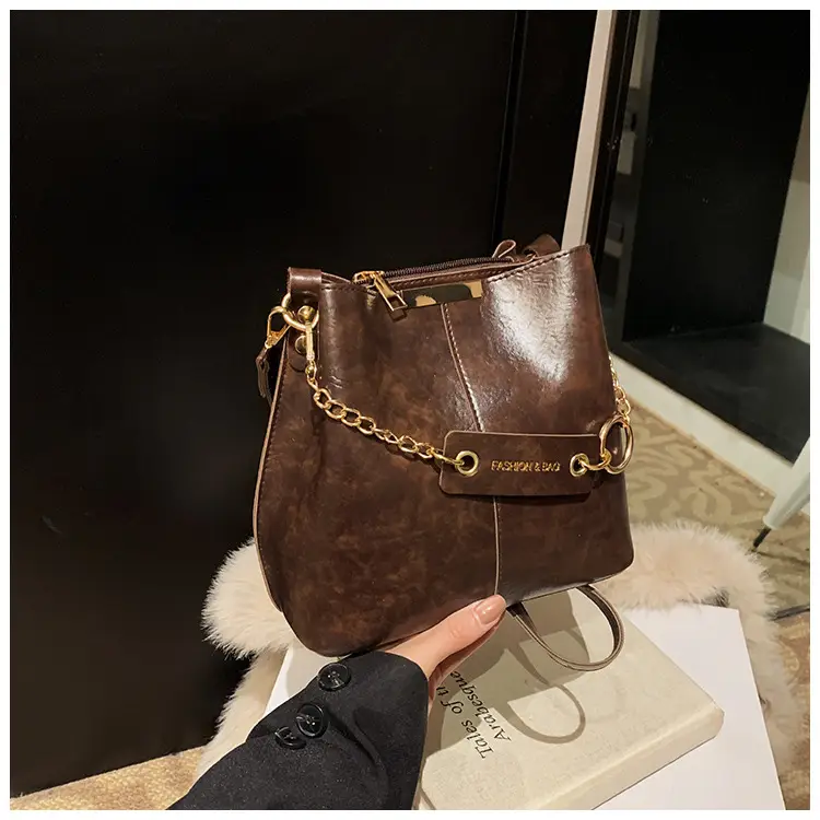 Women's Brown Leather Bucket Bag with Chain Strap — feature 35
