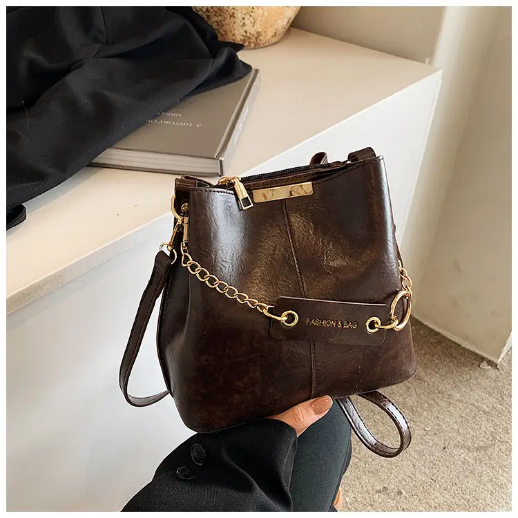 Women's Brown Leather Bucket Bag with Chain Strap — feature 38