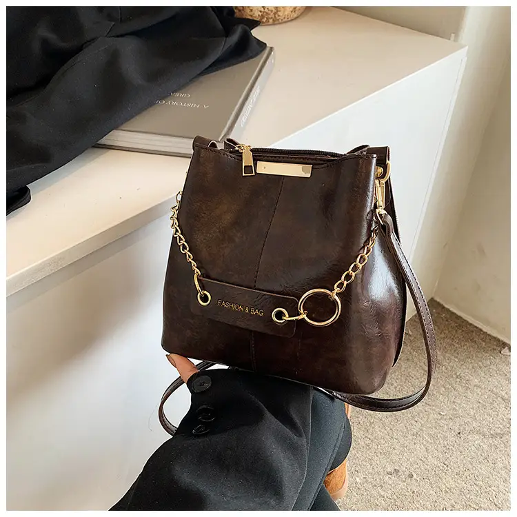 Women's Brown Leather Bucket Bag with Chain Strap — feature 39