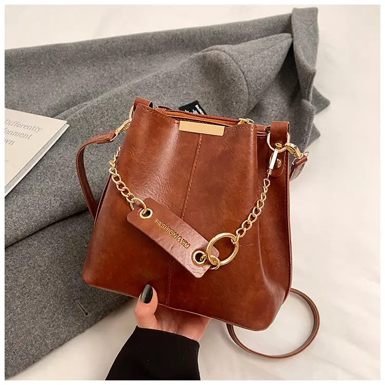Women's Brown Leather Bucket Bag with Chain Strap — feature 41