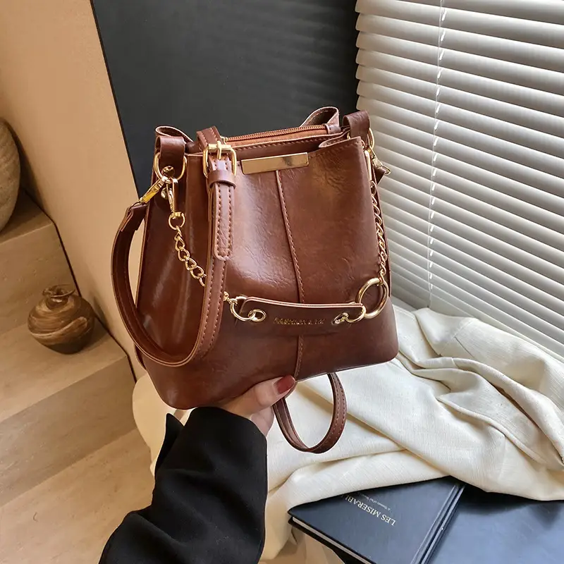 Women's Brown Leather Bucket Bag with Chain Strap