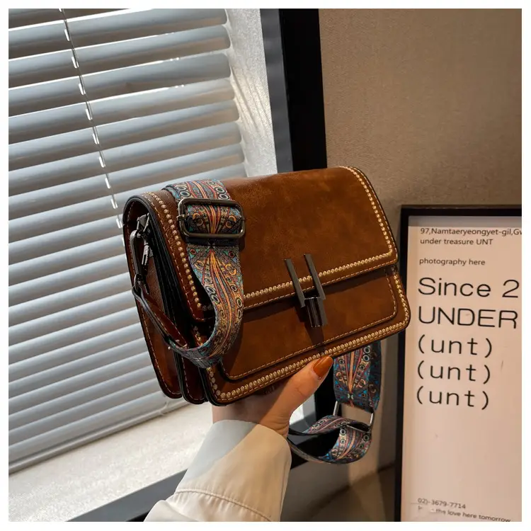 Retro Textured Brown Shoulder Bag with Wide Strap — feature 24
