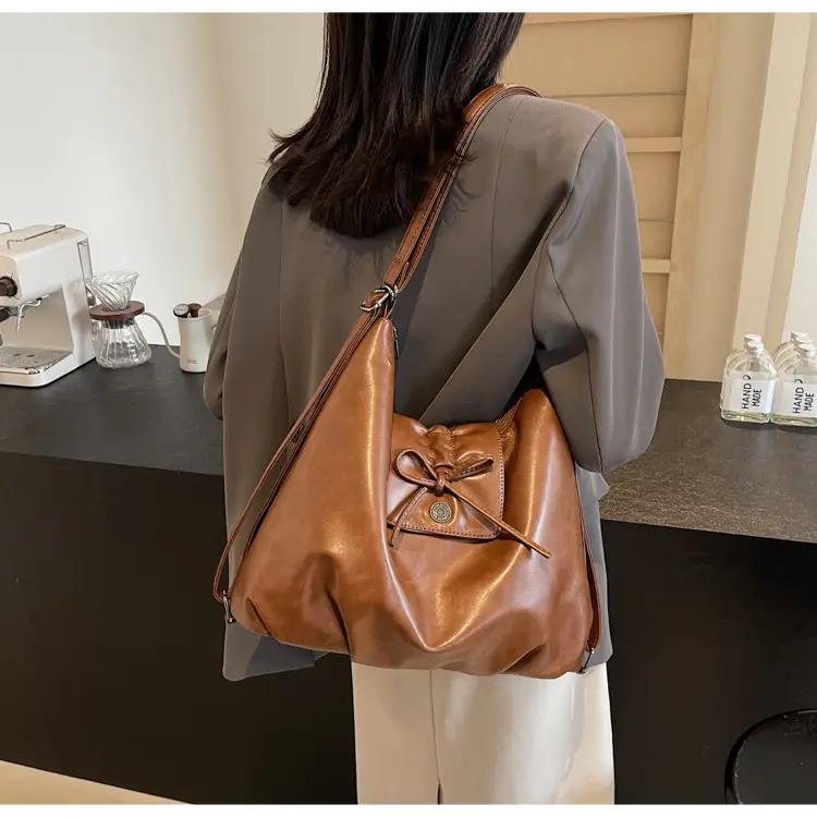 Black Pleated Shoulder Bag with Bow for Women 2026 — feature 23