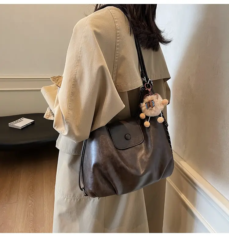 Women's Brown Leather Tote Bag with Pom Pom Charm — feature 22
