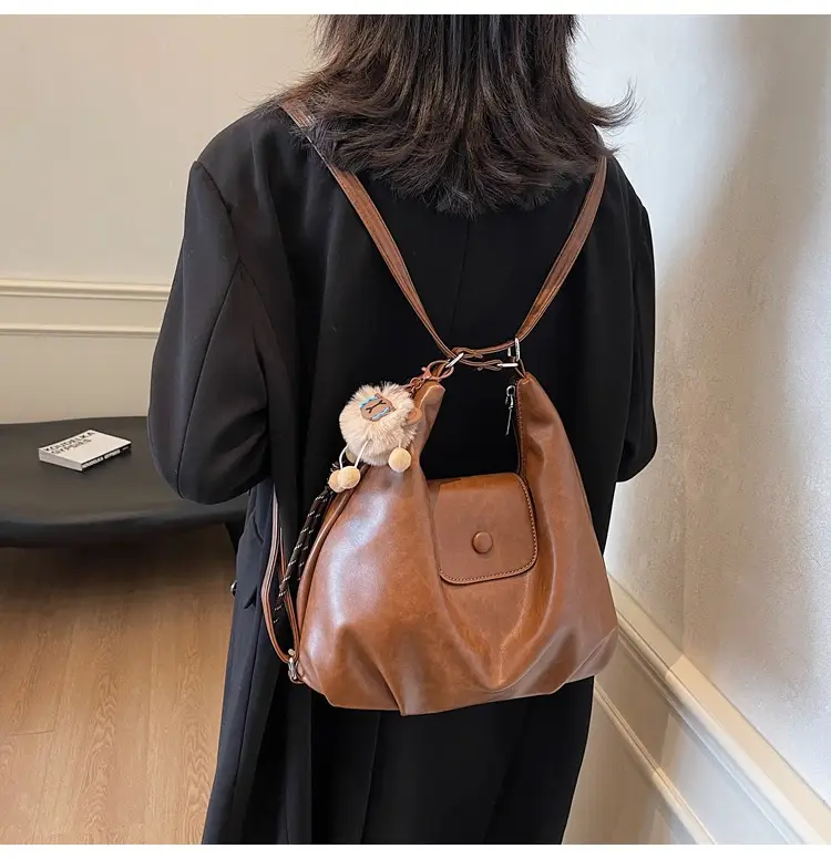 Women's Brown Leather Tote Bag with Pom Pom Charm — feature 26