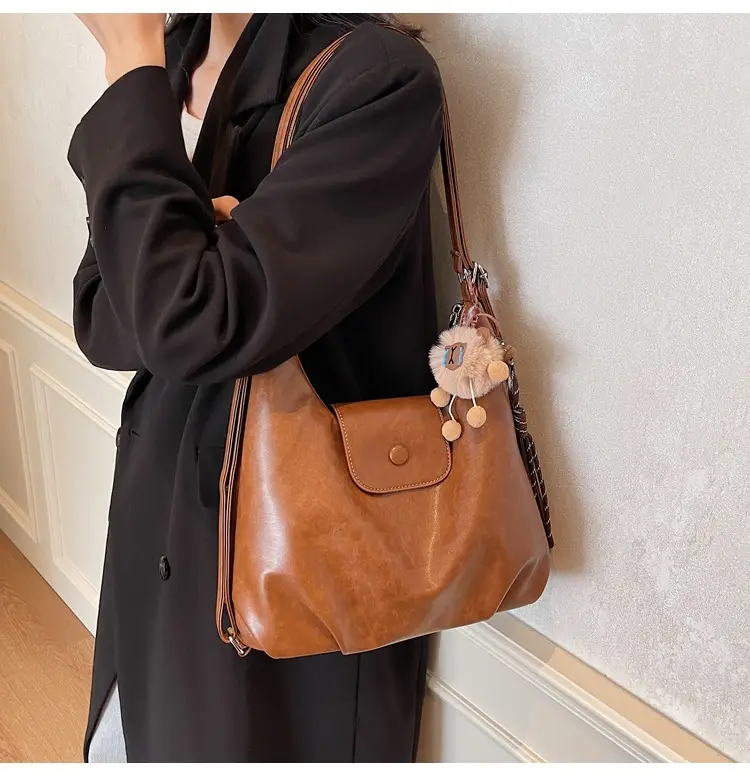 Women's Brown Leather Tote Bag with Pom Pom Charm — feature 32