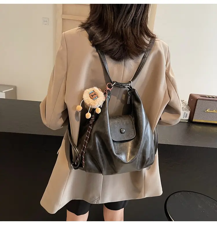 Women's Brown Leather Tote Bag with Pom Pom Charm — feature 38