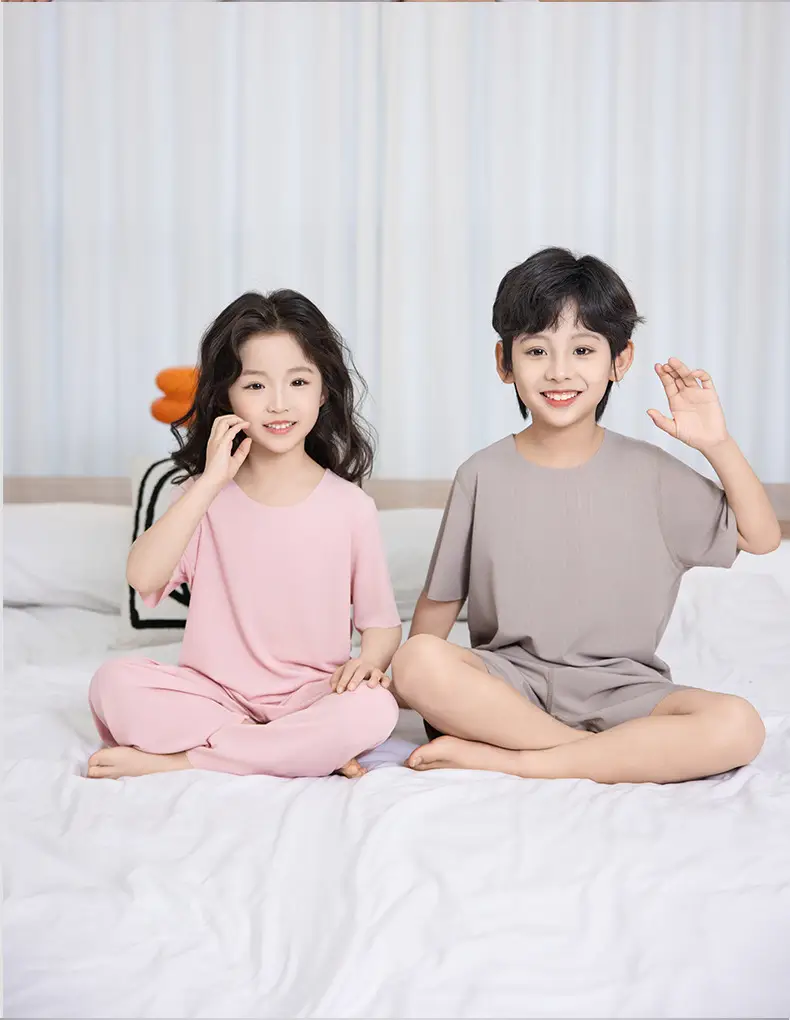 Summer New Style Boys' Short-Sleeved Loose Seamless Ice Silk Home Clothes Children's Two-Piece Set Girls' Pajamas Set Wholesale — feature 12