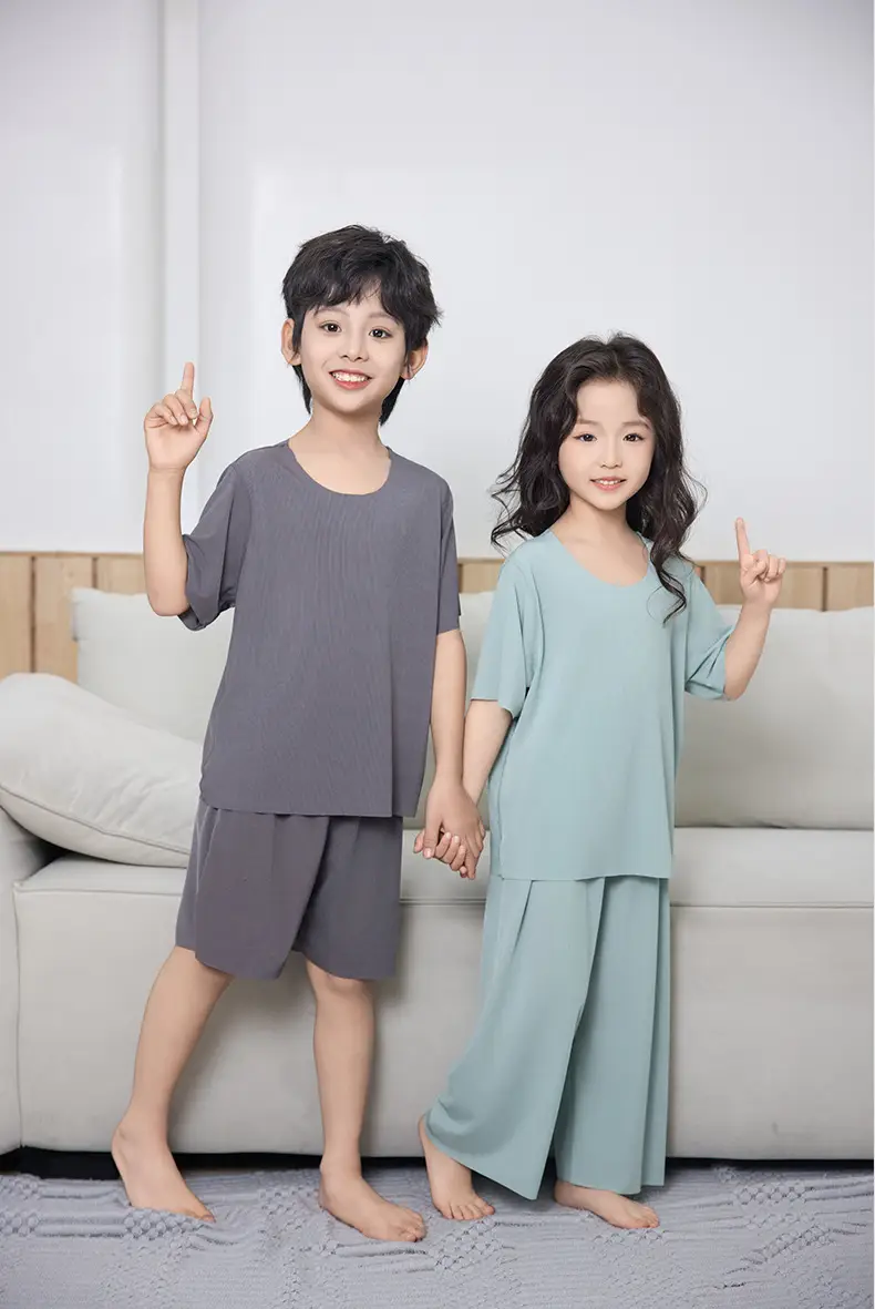 Summer New Style Boys' Short-Sleeved Loose Seamless Ice Silk Home Clothes Children's Two-Piece Set Girls' Pajamas Set Wholesale — feature 16