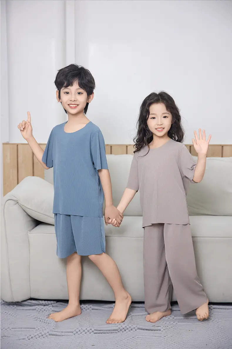 Summer New Style Boys' Short-Sleeved Loose Seamless Ice Silk Home Clothes Children's Two-Piece Set Girls' Pajamas Set Wholesale — feature 17