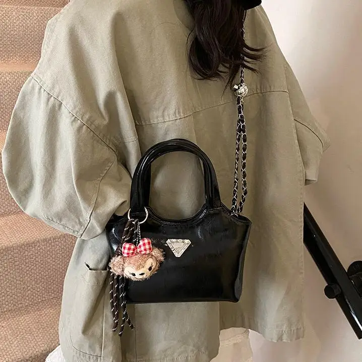 Women's Silver Chain Shoulder Bag with Cute Doll Design - Image 7