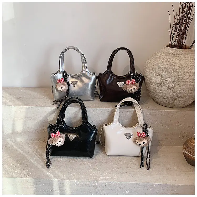 Women's Silver Chain Shoulder Bag with Cute Doll Design — feature 10